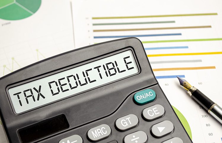 tax-deductible-word-calculator-business-tax-concept