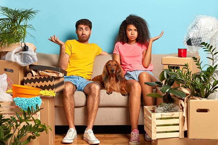 Couple on the couch confused about property deposit & mortgage